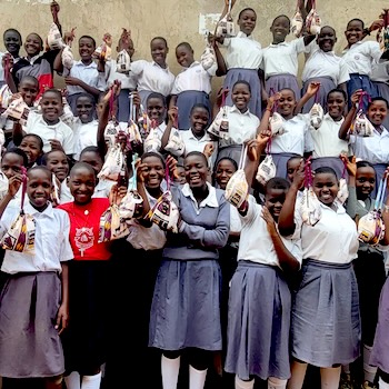 SAG Kit Distribution image showing Kayindu Primary School girls receiving 131 kits in Kayindu, Uganda on Jun 24, 2025