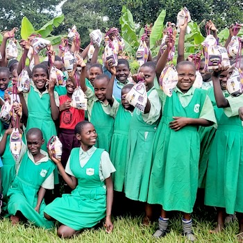 SAG Kit Distribution image showing Sempa Primary School girls receiving 149 kits in Sempa, Uganda on Jun 27, 2025