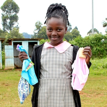 SAG Kit Distribution image showing Ithwagi Primary School girls receiving 165 kits in Ithwagi, Kenya on Jul 11, 2025