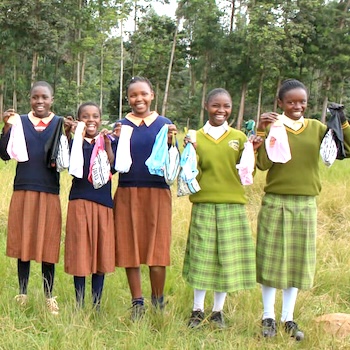 SAG Kit Distribution image showing Giakaibei Primary School girls receiving 163 kits in Giakaibei, Kenya on Jul 17, 2025