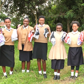 SAG Kit Distribution image showing Muthea High School girls receiving 130 kits in Jambo, Kenya on Jul 24, 2025