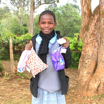 SAG Kit Distribution image showing Gathirathiru Primary School girls receiving 107 kits in Kagochi, Kenya on Jul 29, 2025