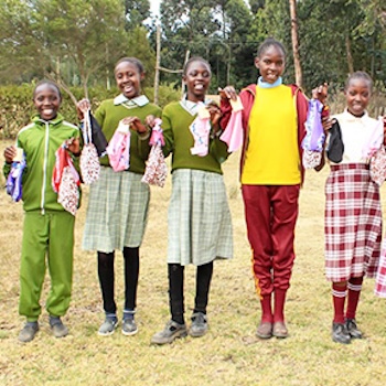 SAG Kit Distribution image showing Mapema Primary School girls receiving 156 kits in Mapema, Kenya on Sep 11, 2025