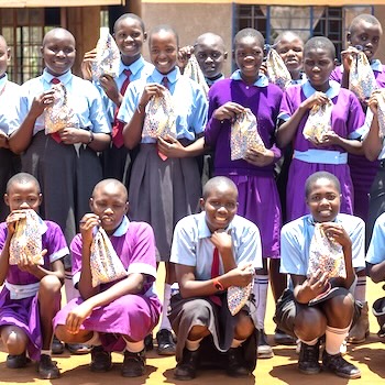SAG Kit Distribution image showing Esikulu Primary girls receiving 234 kits in Busia, Kenya on Sep 18, 2025