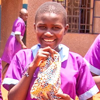 SAG Kit Distribution image showing Esikulu Primary girls receiving 234 kits in Busia, Kenya on Sep 18, 2025