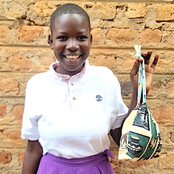SAG Kit Distribution image showing Lady Irene Primary School girls receiving 102 kits in Iganga, Uganda on Sep 25, 2025