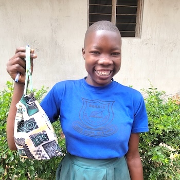 SAG Kit Distribution image showing Bbaale Primary School girls receiving 254 kits in Bbaale, Uganda on Sep 25, 2025
