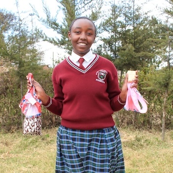 SAG Kit Distribution image showing Kimahuri Primary girls receiving 387 kits in Kimahuri, Kenya on Sep 26, 2025