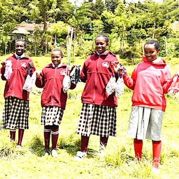 SAG Kit Distribution image showing Kabaru Primary School girls receiving 227 kits in Nyeri, Kenya on Oct 16, 2025