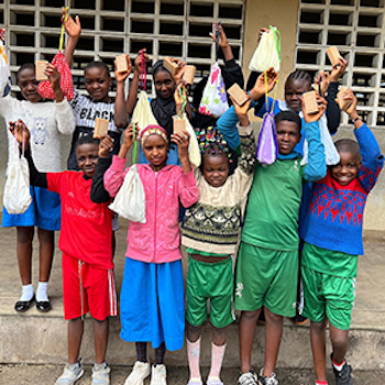 SAG Kit Distribution image showing Government Primary School girls receiving 147 kits in Buea, Cameroon on Oct 17, 2025