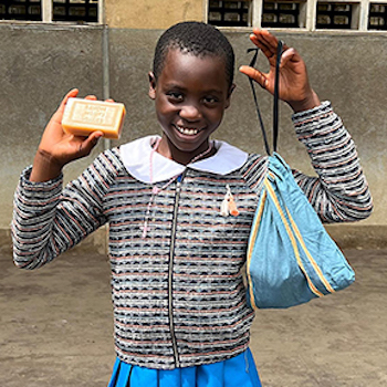 SAG Kit Distribution image showing Government Primary School girls receiving 147 kits in Buea, Cameroon on Oct 17, 2025