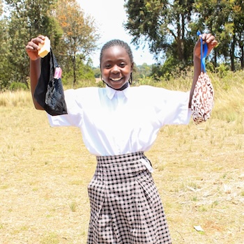 SAG Kit Distribution image showing Warazo Jet Primary School girls receiving 146 kits in Chaka, Kenya on Oct 21, 2025