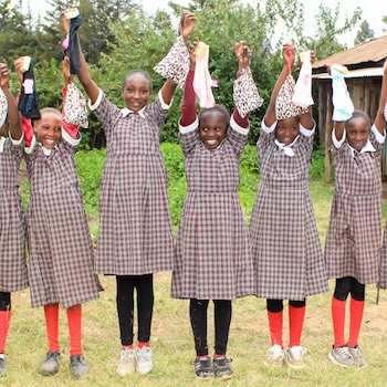 SAG Kit Distribution image showing Mere Primary School girls receiving 185 kits in Maston, Kenya on Oct 21, 2025