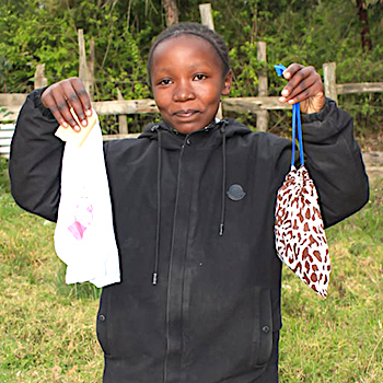 SAG Kit Distribution image showing Kieni Primary School girls receiving 85 kits in Munyu, Kenya on Oct 21, 2025