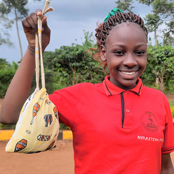 SAG Kit Distribution image showing Montessori N P School girls receiving 102 kits in Luwero, Uganda on Oct 28, 2025