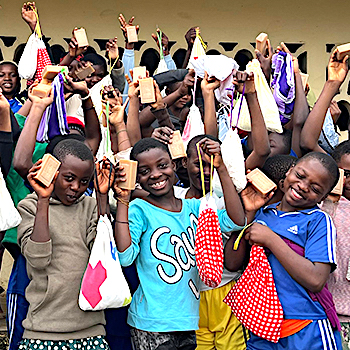 SAG Kit Distribution image showing Molyko Practicing Primary School girls receiving 162 kits in Molyko, Cameroon on Oct 30, 2025