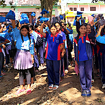 SAG Kit Distribution image showing Sarswati Madhyamik Secondary School girls receiving 150 kits in Ghorahi, Nepal on Nov 12, 2025