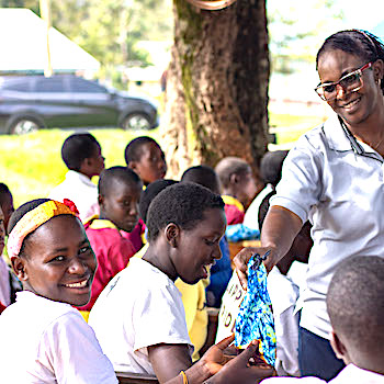 SAG Kit Distribution image showing Buyafwa Primary School girls receiving 217 kits in Buyafwa, Kenya on Nov 13, 2025