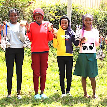 SAG Kit Distribution image showing Mweiga Primary School girls receiving 102 kits in Wmeiga, Kenya on Nov 14, 2025