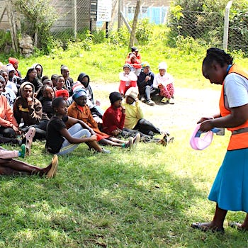 SAG Kit Distribution image showing Mary Martha Primary School girls receiving 85 kits in Wmeiga, Kenya on Nov 14, 2025
