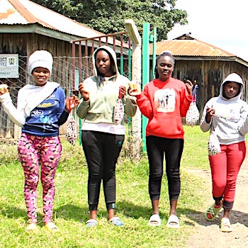 SAG Kit Distribution image showing Mweiga Secondary School girls receiving 103 kits in Wmeiga, Kenya on Nov 14, 2025