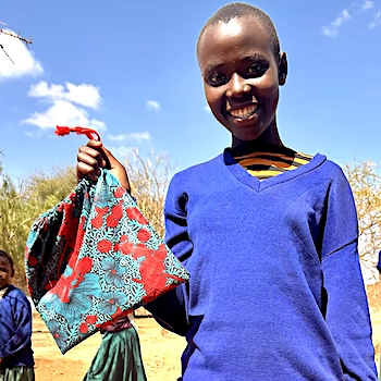 SAG Kit Distribution image showing Kaangala Primary School girls receiving 100 kits in Simanjiro, Tanzania on Dec 5, 2025