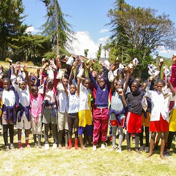 SAG Kit Distribution image showing Charity Primary School girls receiving 185 kits in Charity, Kenya on Feb 25, 2025
