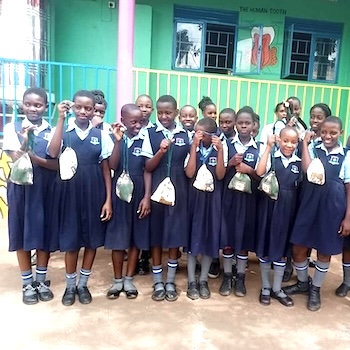 SAG Kit Distribution image showing Felister Junior School girls receiving 40 kits in Kampala, Uganda on Mar 3, 2025