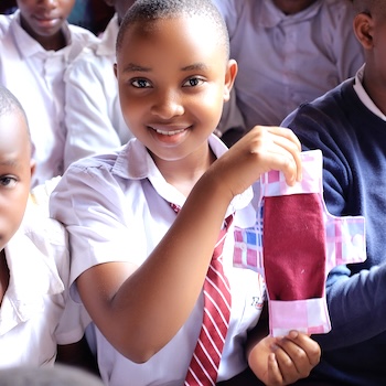 SAG Kit Distribution image showing Katwe Martyrs Primary School girls receiving 105 kits in Katwe, Uganda on Feb 20, 2025