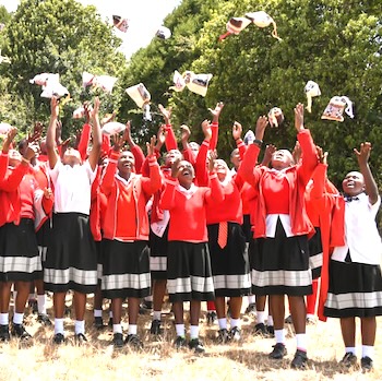 SAG Kit Distribution image showing Kiaragana Secondary School girls receiving 108 kits in Kiawara, Kenya on Mar 7, 2025