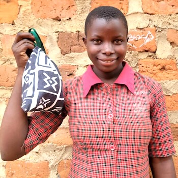SAG Kit Distribution image showing Lukomera School girls receiving 253 kits in Lukomera, Uganda on Mar 4, 2025