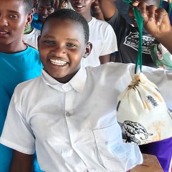 SAG Kit Distribution image showing Molinabany Primary School girls receiving 51 kits in Molinabany, Kenya on Mar 1, 2025