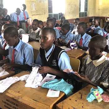SAG Kit Distribution image showing Olochura Primary School girls receiving 57 kits in Aitong, Kenya on Jan 27, 2025