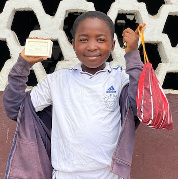 SAG Kit Distribution image showing Volunteer for Excellence Primary School girls receiving 84 kits in Molyko, Cameroon on Feb 28, 2025