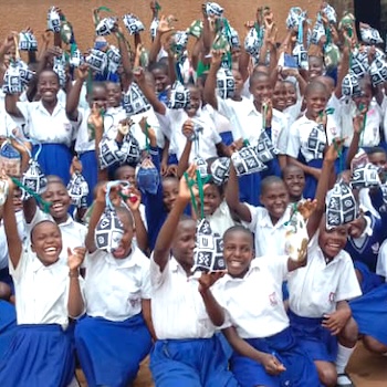 SAG Kit Distribution image showing Wobulenzi Primary School girls receiving 211 kits in Wobulenzi, Uganda on Mar 11, 2025