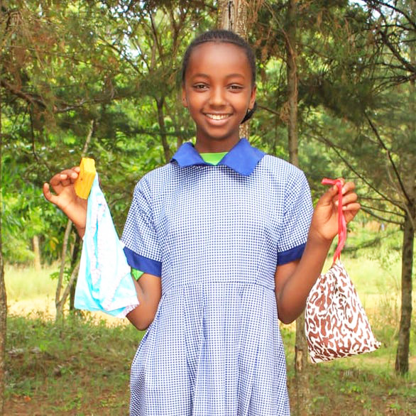 SAG Kit Distribution image showing Munyu Primary School girls receiving 205 kits in Munyu, Kenya on Jan 13, 2026