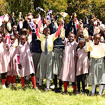SAG Kit Distribution image showing Kamburaini Primary School girls receiving 179 kits in Kamburaini, Kenya on Jan 23, 2026