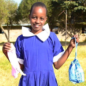 SAG Kit Distribution image showing Sweetwaters Primary School girls receiving 175 kits in Sweetwaters, Kenya on Jan 27, 2026