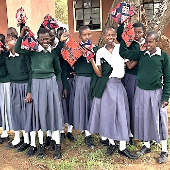 SAG Kit Distribution image showing Loiborsiret Secondary School girls receiving 67 kits in Kimanjiro, Tanzania on Jan 28, 2026