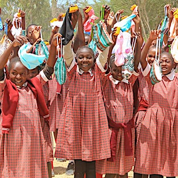 SAG Kit Distribution image showing DEB Yard Primary School girls receiving 95 kits in Nanyuki, Kenya on Feb 12, 2026