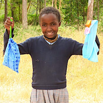 SAG Kit Distribution image showing Irura Primary School girls receiving 150 kits in Sweetwater, Kenya on Feb 12, 2026