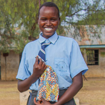 SAG Kit Distribution image showing Nailumpe Comprehensive School girls receiving 91 kits in Nailumpe, Kenya on Feb 13, 2026
