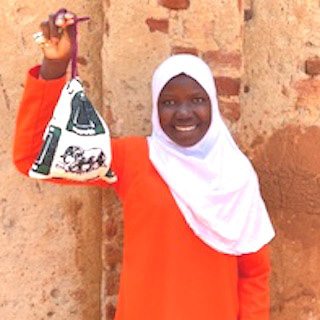 SAG Kit Distribution image showing Nakaloke Primary School girls receiving 237 kits in Mbale, Uganda on Feb 17, 2026