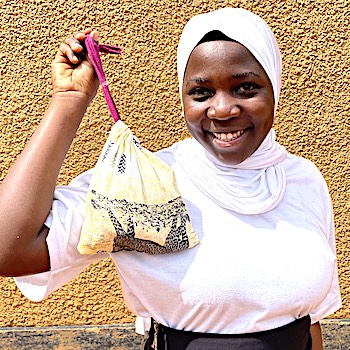 SAG Kit Distribution image showing Nakaloke Secondary School girls receiving 263 kits in Mbale, Uganda on Feb 17, 2026