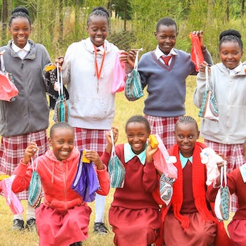 SAG Kit Distribution image showing Ndiriti Primary School girls receiving 160 kits in Naromoru, Kenya on Feb 18, 2026