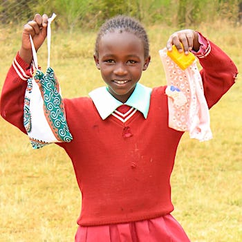 SAG Kit Distribution image showing Ndiriti Primary School girls receiving 160 kits in Naromoru, Kenya on Feb 18, 2026