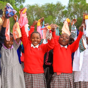 SAG Kit Distribution image showing Aguthi Primary School girls receiving 123 kits in Aguthi, Kenya on Feb 18, 2026