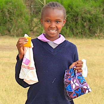 SAG Kit Distribution image showing Aguthi Primary School girls receiving 123 kits in Aguthi, Kenya on Feb 18, 2026