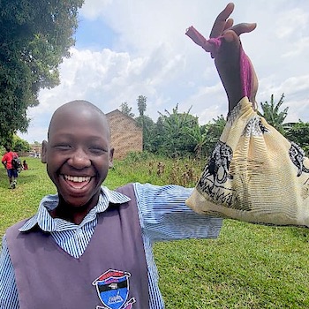 SAG Kit Distribution image showing Nabiteete Parents School girls receiving 150 kits in Bamunanika, Uganda on Feb 20, 2026
