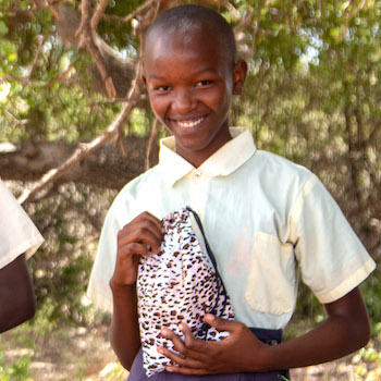 SAG Kit Distribution image showing Kanguli Comprehensive School girls receiving 71 kits in Kanguli, Kenya on Feb 21, 2026